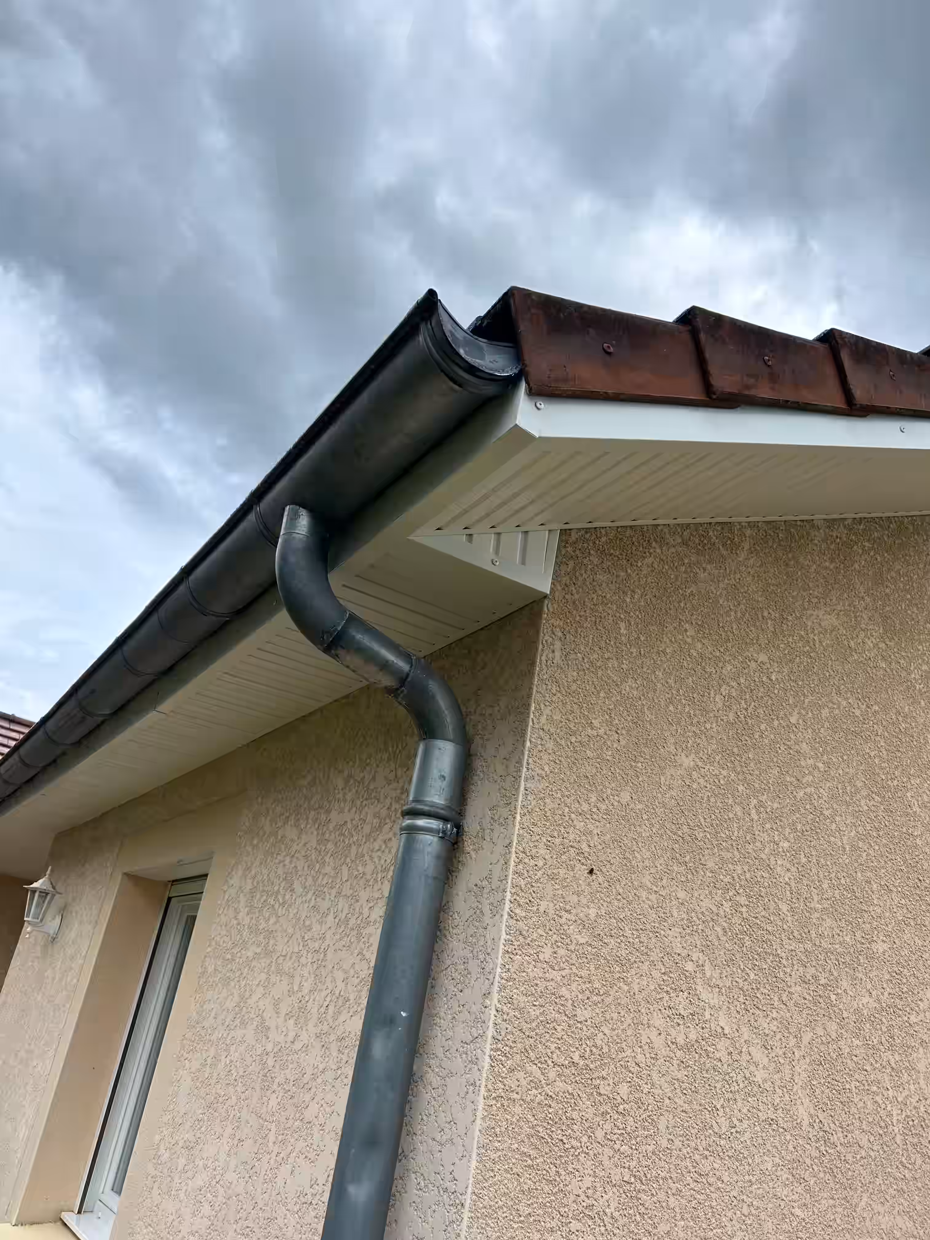 Bardage bois habillé en aluminium laqué, finition neuve